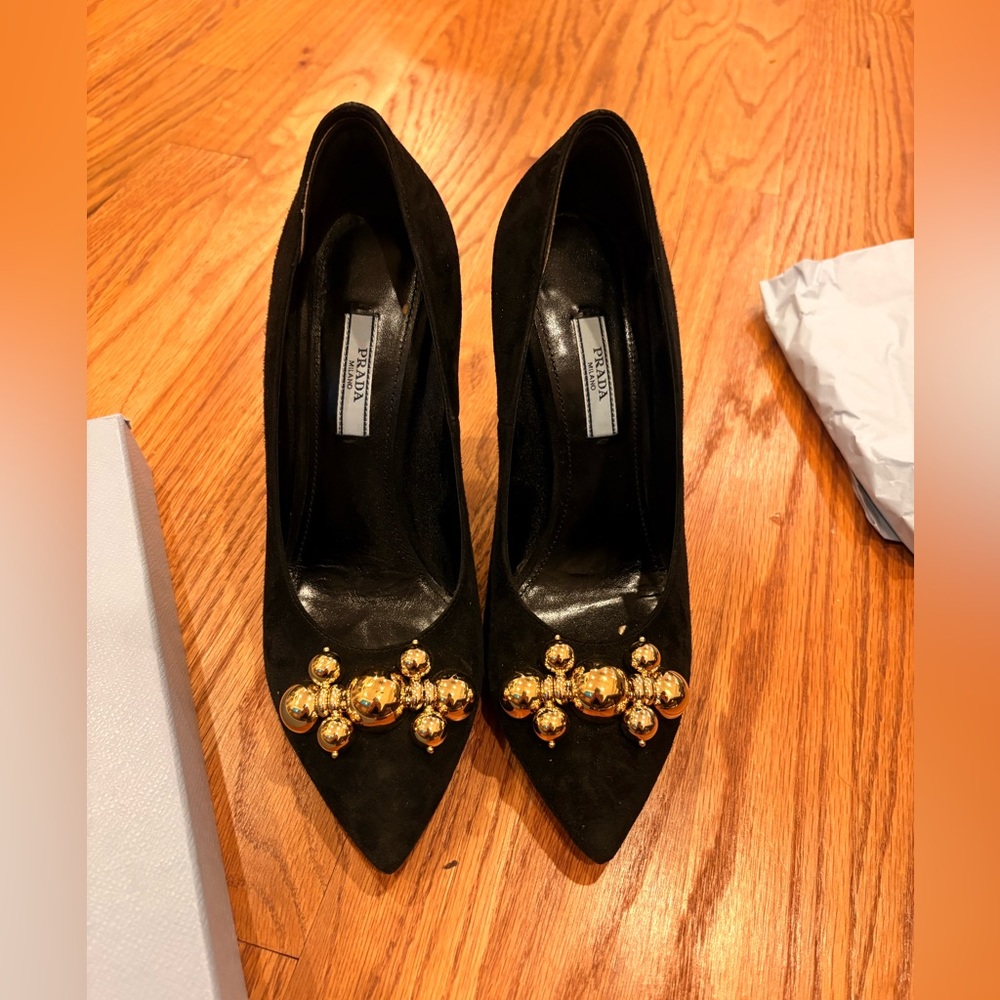 Prada Black Heels with Gold Embellishments